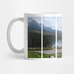 The fabulous alpine lake of Carezza in the Dolomites (Bolzano). Lovely place in the Italian Alps. Reflections in the water. View from the hill. Sunny spring day. Trentino Alto Adige Mug